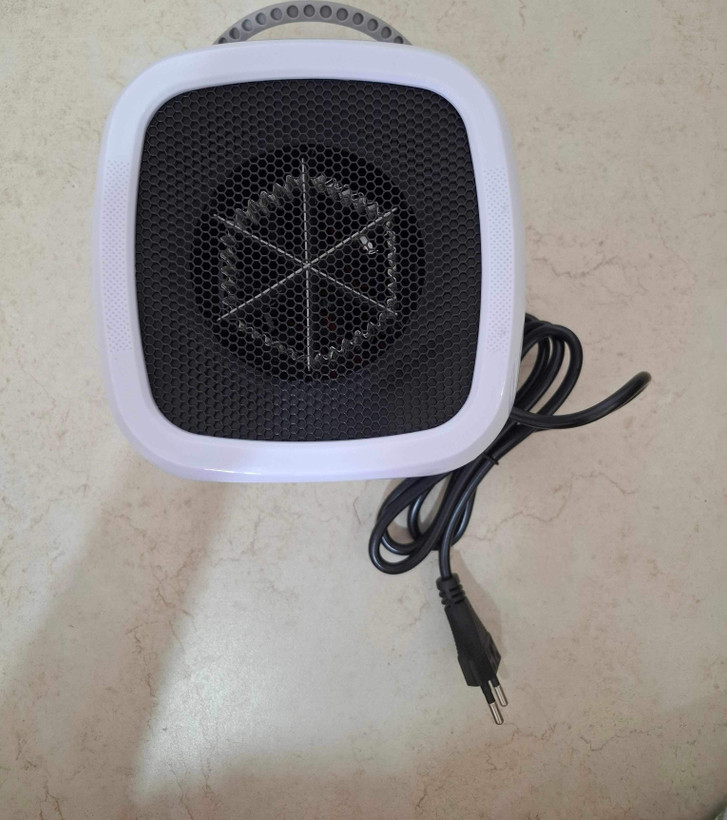 بخاری برقی مینی و فن هیتر هوشمند طرح تلوزیون فانتزی (Intelligent Heater)