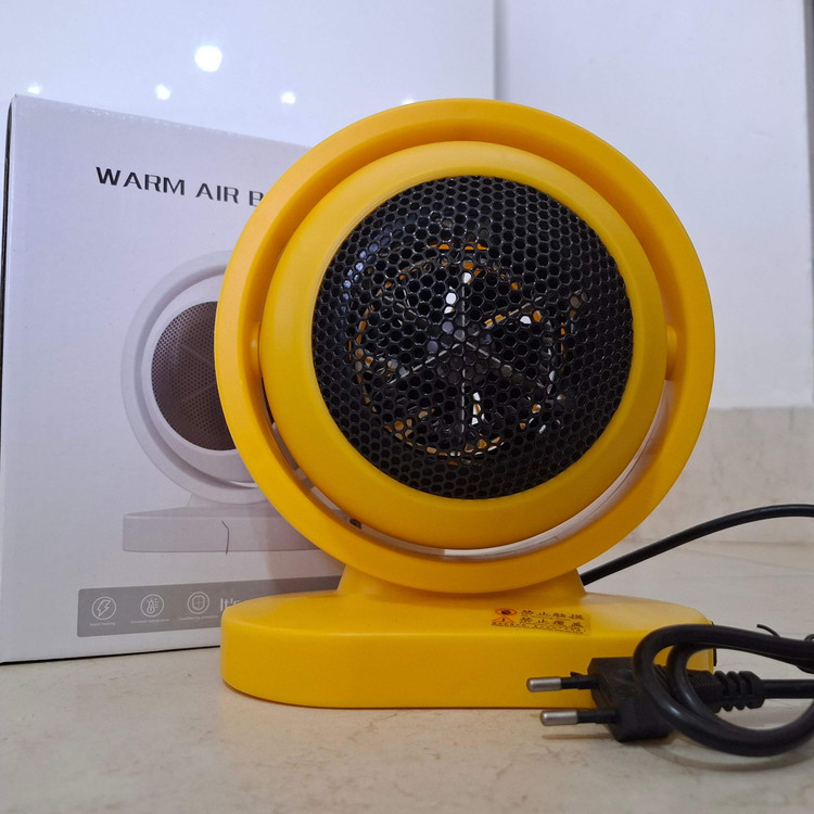 بخاری برقی و گرمکن رومیزی مدل Warm Air Blower A1 (فن هیتر mini رومیزی قابل حمل)